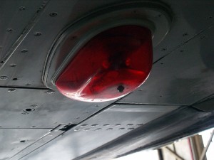 Navigation light on the belly of a jet